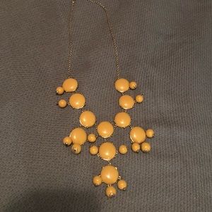 Mustard yellow bubble necklace.